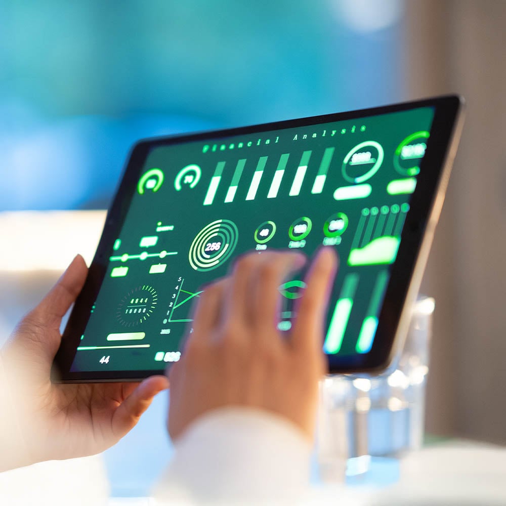 Dashboard of analytics and charts on a tablet