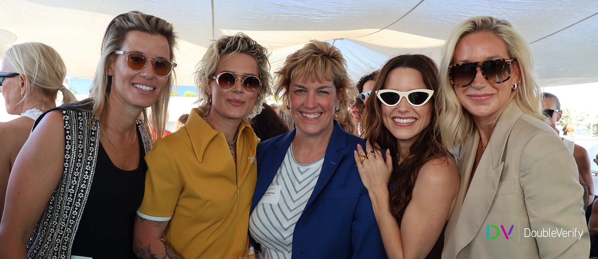 Photo taken on DV's yacht at the 2024 Cannes Lions International Festival of Creativity showing five women standing side-by-side and facing the camera while smiling.